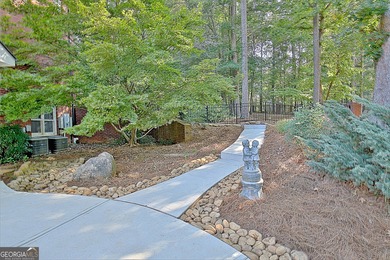 A SWEETHEART of a DEAL! You will not want to miss this home, it on Whitewater Creek in Georgia - for sale on GolfHomes.com, golf home, golf lot