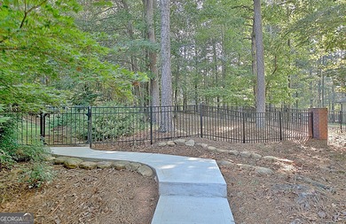 A SWEETHEART of a DEAL! You will not want to miss this home, it on Whitewater Creek in Georgia - for sale on GolfHomes.com, golf home, golf lot