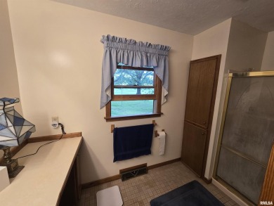 This 3 bedroom, 3 bath home offers a perfect blend of lakefront on Metropolis Country Club in Illinois - for sale on GolfHomes.com, golf home, golf lot