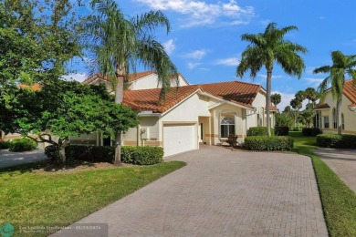 Rarely available corner villa in the exclusive, gated community on Palm-Aire Country Club and Resort - The Oaks in Florida - for sale on GolfHomes.com, golf home, golf lot