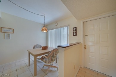 Waterfront Retreat with Boat Slip! Welcome to the ease of on Saint Andrews South Golf Club in Florida - for sale on GolfHomes.com, golf home, golf lot
