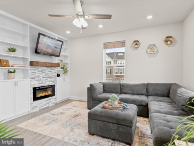 Welcome to 35413 Wright Way, a beautiful three-story end-unit on Plantation Lakes Golf and Country Club in Delaware - for sale on GolfHomes.com, golf home, golf lot
