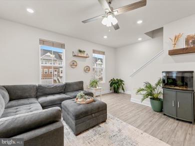 Welcome to 35413 Wright Way, a beautiful three-story end-unit on Plantation Lakes Golf and Country Club in Delaware - for sale on GolfHomes.com, golf home, golf lot