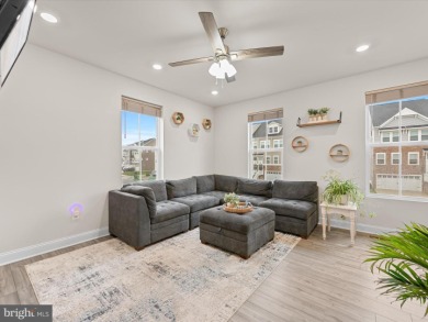 Welcome to 35413 Wright Way, a beautiful three-story end-unit on Plantation Lakes Golf and Country Club in Delaware - for sale on GolfHomes.com, golf home, golf lot