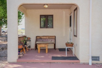 Welcome to this beautiful and UNIQUE  rancher. The  property is on Desert Hawk At Pueblo West in Colorado - for sale on GolfHomes.com, golf home, golf lot