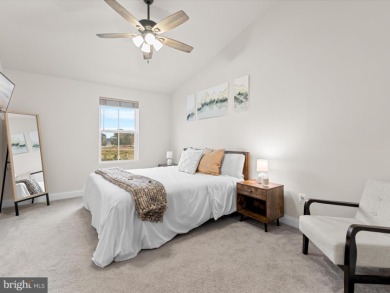 Welcome to 35413 Wright Way, a beautiful three-story end-unit on Plantation Lakes Golf and Country Club in Delaware - for sale on GolfHomes.com, golf home, golf lot