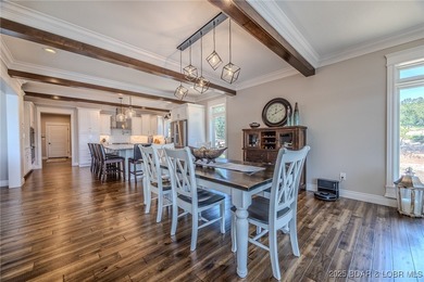 Introducing East Villages! An exquisite lakefront property on The Club At Porto Cima in Missouri - for sale on GolfHomes.com, golf home, golf lot