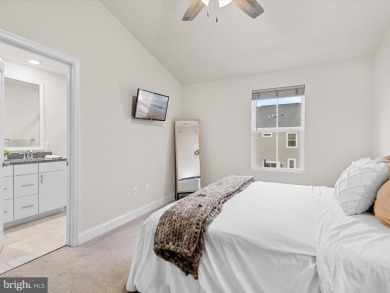 Welcome to 35413 Wright Way, a beautiful three-story end-unit on Plantation Lakes Golf and Country Club in Delaware - for sale on GolfHomes.com, golf home, golf lot