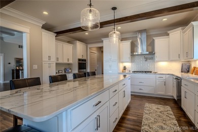 Introducing East Villages! An exquisite lakefront property on The Club At Porto Cima in Missouri - for sale on GolfHomes.com, golf home, golf lot