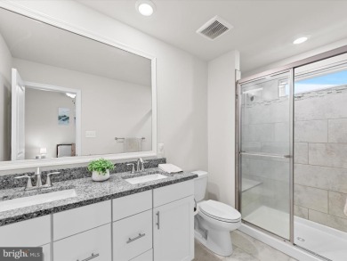 Welcome to 35413 Wright Way, a beautiful three-story end-unit on Plantation Lakes Golf and Country Club in Delaware - for sale on GolfHomes.com, golf home, golf lot