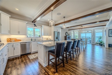 Introducing East Villages! An exquisite lakefront property on The Club At Porto Cima in Missouri - for sale on GolfHomes.com, golf home, golf lot