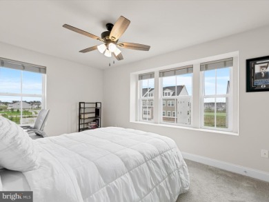 Welcome to 35413 Wright Way, a beautiful three-story end-unit on Plantation Lakes Golf and Country Club in Delaware - for sale on GolfHomes.com, golf home, golf lot