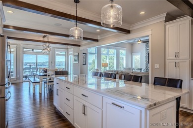 Introducing East Villages! An exquisite lakefront property on The Club At Porto Cima in Missouri - for sale on GolfHomes.com, golf home, golf lot