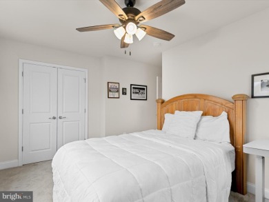 Welcome to 35413 Wright Way, a beautiful three-story end-unit on Plantation Lakes Golf and Country Club in Delaware - for sale on GolfHomes.com, golf home, golf lot