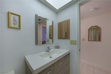 Waterfront Retreat with Boat Slip! Welcome to the ease of on Saint Andrews South Golf Club in Florida - for sale on GolfHomes.com, golf home, golf lot
