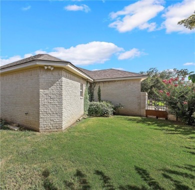 Welcome to this stunning custom home in the exclusive North on The Lake Country Club - Lake Waco in Texas - for sale on GolfHomes.com, golf home, golf lot