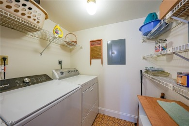 Waterfront Retreat with Boat Slip! Welcome to the ease of on Saint Andrews South Golf Club in Florida - for sale on GolfHomes.com, golf home, golf lot