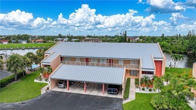 Waterfront Retreat with Boat Slip! Welcome to the ease of on Saint Andrews South Golf Club in Florida - for sale on GolfHomes.com, golf home, golf lot