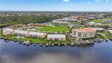 Waterfront Retreat with Boat Slip! Welcome to the ease of on Saint Andrews South Golf Club in Florida - for sale on GolfHomes.com, golf home, golf lot