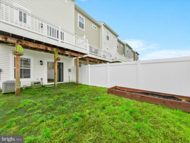 Welcome to 35413 Wright Way, a beautiful three-story end-unit on Plantation Lakes Golf and Country Club in Delaware - for sale on GolfHomes.com, golf home, golf lot