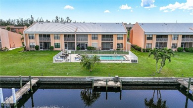 Waterfront Retreat with Boat Slip! Welcome to the ease of on Saint Andrews South Golf Club in Florida - for sale on GolfHomes.com, golf home, golf lot