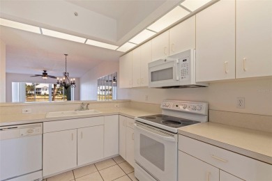 Introducing this Immaculate  Move-In Ready Ground Floor Venice on Pelican Pointe Golf and Country Club in Florida - for sale on GolfHomes.com, golf home, golf lot