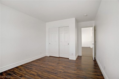 LOCATED IN THE HIGHLY SOUGHT-AFTER, GUARD-GATED GOLF COURSE on Rhodes Ranch Golf Club in Nevada - for sale on GolfHomes.com, golf home, golf lot