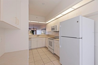 Introducing this Immaculate  Move-In Ready Ground Floor Venice on Pelican Pointe Golf and Country Club in Florida - for sale on GolfHomes.com, golf home, golf lot