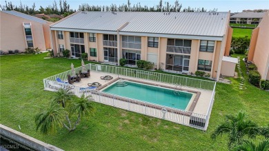 Waterfront Retreat with Boat Slip! Welcome to the ease of on Saint Andrews South Golf Club in Florida - for sale on GolfHomes.com, golf home, golf lot