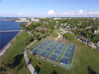 Waterfront Retreat with Boat Slip! Welcome to the ease of on Saint Andrews South Golf Club in Florida - for sale on GolfHomes.com, golf home, golf lot