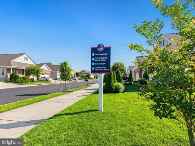 Welcome to 35413 Wright Way, a beautiful three-story end-unit on Plantation Lakes Golf and Country Club in Delaware - for sale on GolfHomes.com, golf home, golf lot