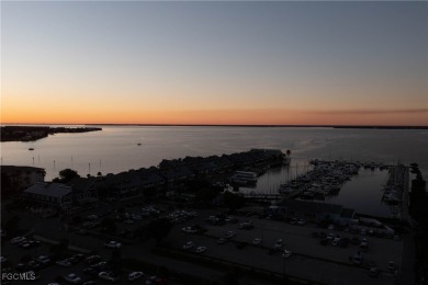 Waterfront Retreat with Boat Slip! Welcome to the ease of on Saint Andrews South Golf Club in Florida - for sale on GolfHomes.com, golf home, golf lot