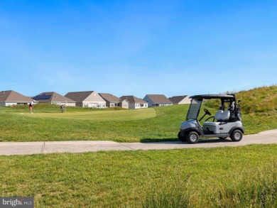 Welcome to 35413 Wright Way, a beautiful three-story end-unit on Plantation Lakes Golf and Country Club in Delaware - for sale on GolfHomes.com, golf home, golf lot