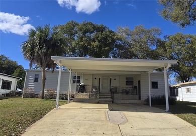 LAND-OWNED two-bedroom, two-bath home available in Zellwood on Zellwood Station Country Club in Florida - for sale on GolfHomes.com, golf home, golf lot