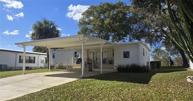 LAND-OWNED two-bedroom, two-bath home available in Zellwood on Zellwood Station Country Club in Florida - for sale on GolfHomes.com, golf home, golf lot