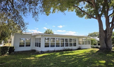 LAND-OWNED two-bedroom, two-bath home available in Zellwood on Zellwood Station Country Club in Florida - for sale on GolfHomes.com, golf home, golf lot