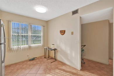 JUST SIT BACK, RELAX AND ENJOY THE VIEW OF THE CALMING WATER AND on Flamingo Lakes Country Club in Florida - for sale on GolfHomes.com, golf home, golf lot