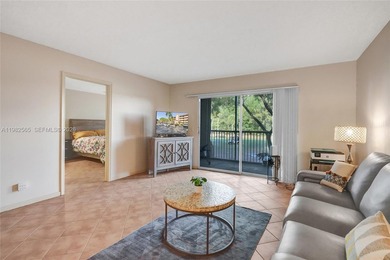 JUST SIT BACK, RELAX AND ENJOY THE VIEW OF THE CALMING WATER AND on Flamingo Lakes Country Club in Florida - for sale on GolfHomes.com, golf home, golf lot