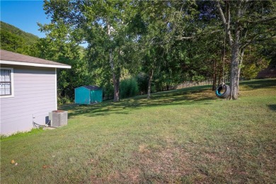 Welcome to this charming fully remodeled cottage style home on Holiday Island Executive Golf Course in Arkansas - for sale on GolfHomes.com, golf home, golf lot