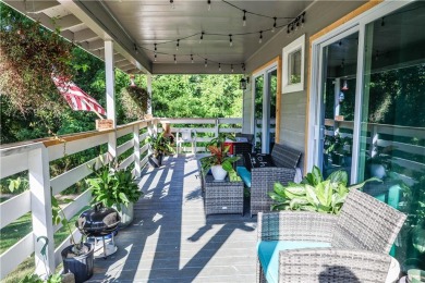 Welcome to this charming fully remodeled cottage style home on Holiday Island Executive Golf Course in Arkansas - for sale on GolfHomes.com, golf home, golf lot