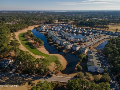 Welcome to your dream retreat! Nestled in the highly on Sandpiper Bay Golf and Country Club in North Carolina - for sale on GolfHomes.com, golf home, golf lot