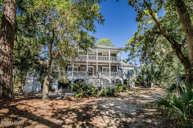 Live the lowcountry life in this beautiful, luxury, updated, low on Ocean Creek Golf Course in South Carolina - for sale on GolfHomes.com, golf home, golf lot