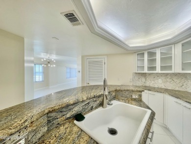 Discover coastal elegance in this 3-bedroom, 3-bathroom on Harbour Village Golf and Yacht Club in Florida - for sale on GolfHomes.com, golf home, golf lot