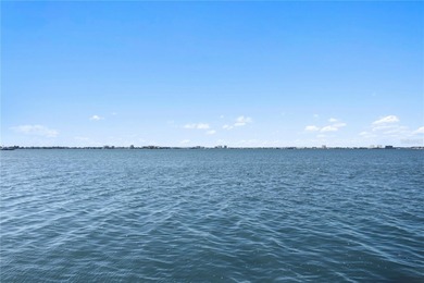 Welcome home to paradise at Isla Key, a coveted waterfront on Isla Del Sol Yacht and Country Club in Florida - for sale on GolfHomes.com, golf home, golf lot