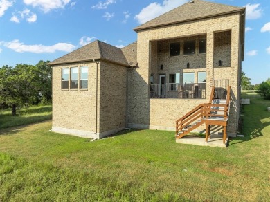 Discover Lakeside Luxury in this stunning custom residence on White Bluff Resort - Old Course in Texas - for sale on GolfHomes.com, golf home, golf lot