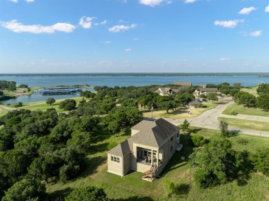 Discover Lakeside Luxury in this stunning custom residence on White Bluff Resort - Old Course in Texas - for sale on GolfHomes.com, golf home, golf lot