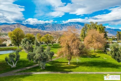 Nestled in the highly sought-after, guard-gated Premiere 55+ on Date Palm Country Club in California - for sale on GolfHomes.com, golf home, golf lot