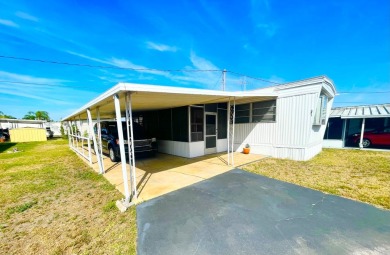 This home is located in a 55+ community!! This CUTE and UPDATED on Lone Palm Golf Club in Florida - for sale on GolfHomes.com, golf home, golf lot