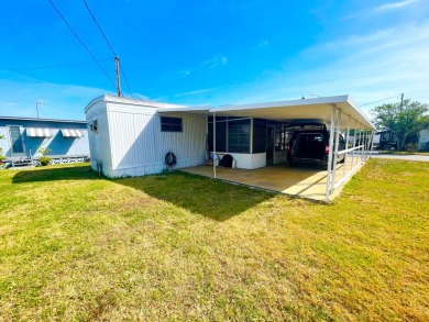 This home is located in a 55+ community!! This CUTE and UPDATED on Lone Palm Golf Club in Florida - for sale on GolfHomes.com, golf home, golf lot