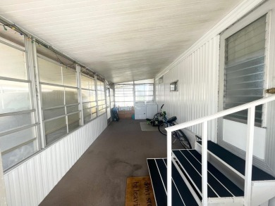 This home is located in a 55+ community!! This CUTE and UPDATED on Lone Palm Golf Club in Florida - for sale on GolfHomes.com, golf home, golf lot